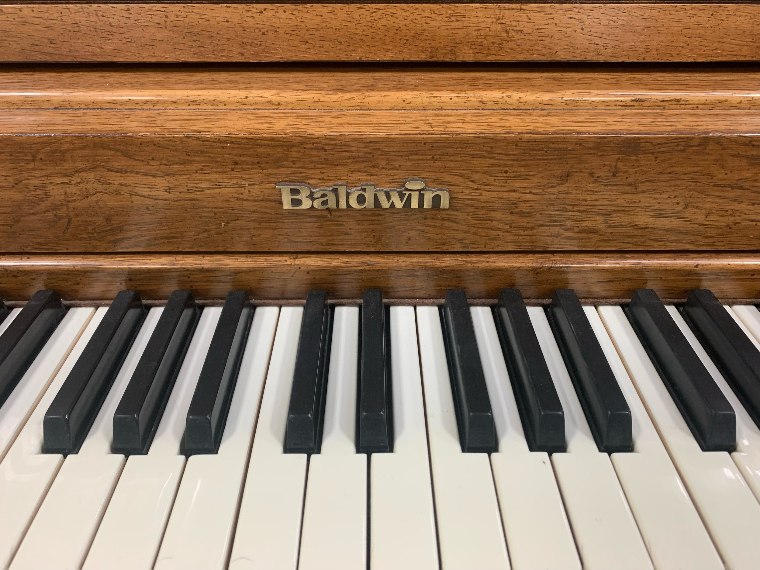 Baldwin Piano - Warm Pecan Finish